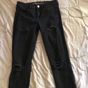 Black distressed skinny jeans